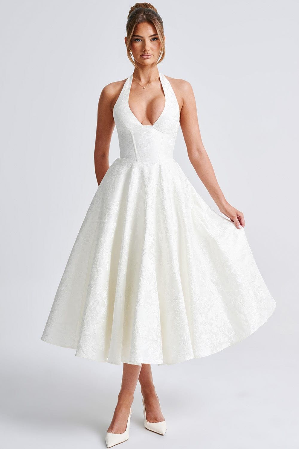 Camila™ | Vestido midi con escote halter y falda acampanada