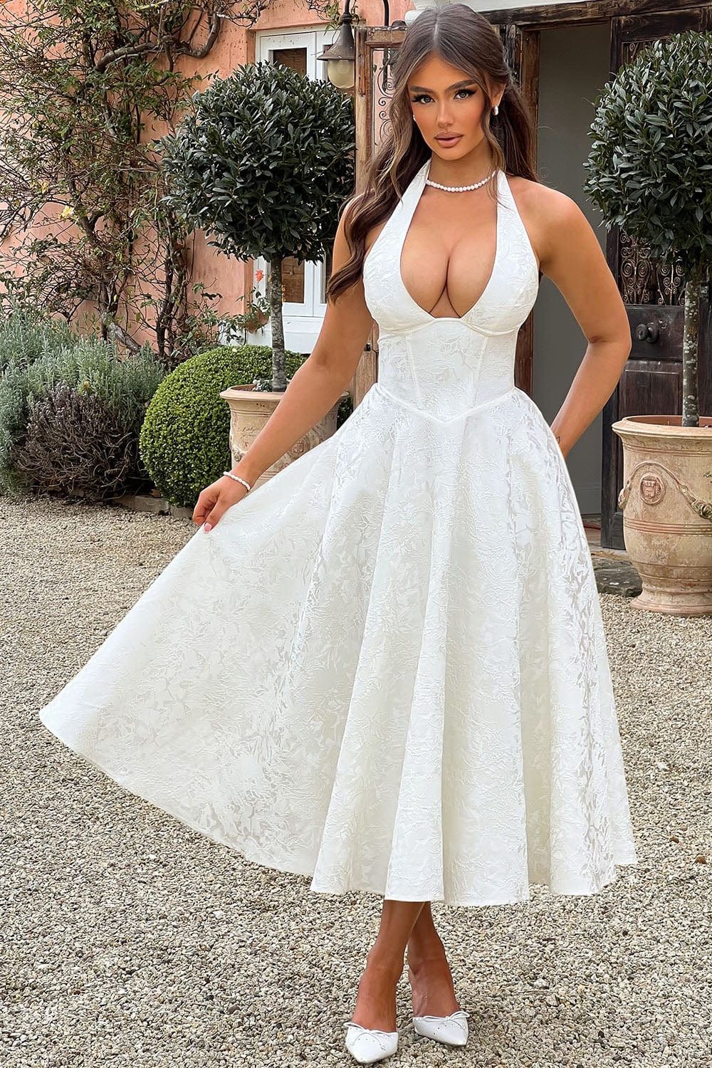 Camila™ | Vestido midi con escote halter y falda acampanada
