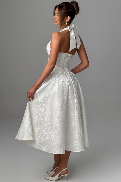 Camila™ | Vestido midi con escote halter y falda acampanada