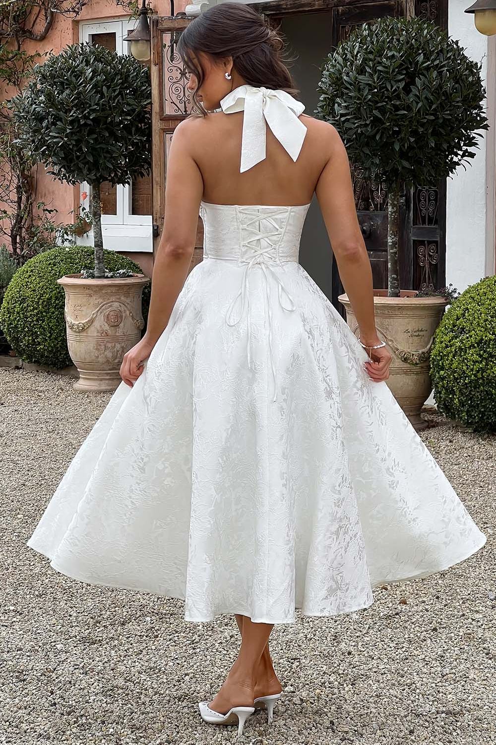 Camila™ | Vestido midi con escote halter y falda acampanada