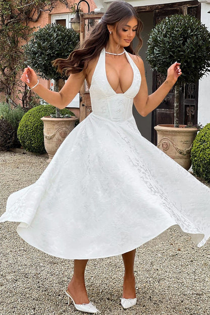 Camila™ | Vestido midi con escote halter y falda acampanada
